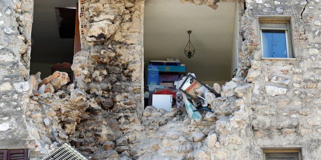 A damaged house is seen following an earthquake in Norcia, Italy, October 30, 2016. REUTERS/Remo Casilli