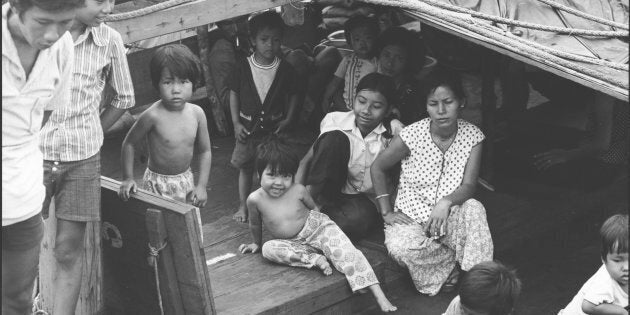 Children and women in cabin on a boat from Vietnam, in Darwin in 1977.