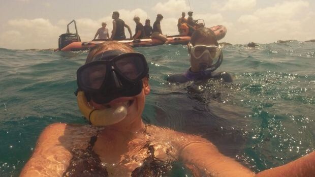 Elly Warren diving in Africa. According to friends, she was a loving, adventurous young woman.