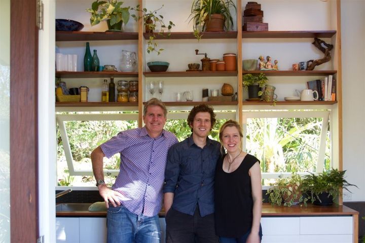 Greg Thornton, Lara Nobel and Andrew Carter in the tiny house's Brisbane location.