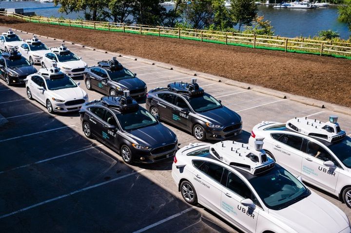 Pilot models of the Uber self-driving car are displayed at the Uber Advanced Technologies Center on September 13, 2016.