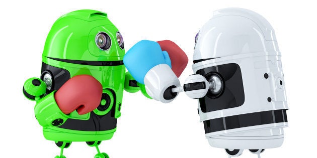 Toy robots fighting. Technology concept. Isolated over white. Contains clipping path