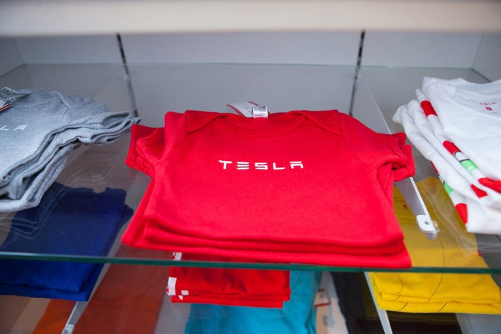 Yes, that is a Tesla baby outfit.