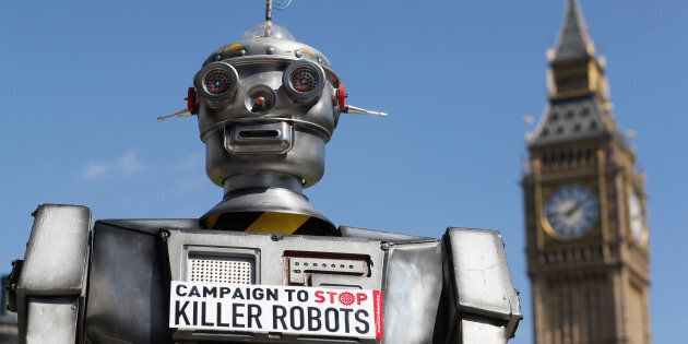 LONDON, ENGLAND - APRIL 23: A robot distributes promotional literature calling for a ban on fully autonomous weapons.