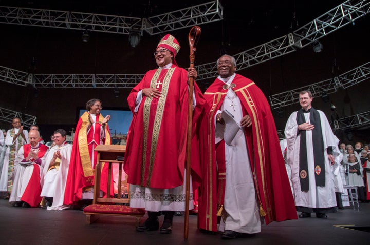 Rev. Phoebe Roaf (center), flanked by Bishop Michael B. Curry, is consecrated a bishop in Hope Church in Memphis on May 4, 20