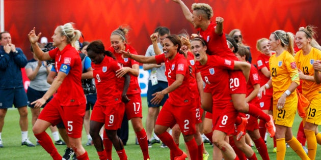 EDMONTON, AB - JULY 4: Team members from England react to their win over Germany during the FIFA Women's World Cup Canada 3rd Place Play-off match between England and Germany at Commonwealth Stadium on July 4, 2015 in Edmonton, Alberta, Canada. (Photo by Todd Korol/Getty Images)