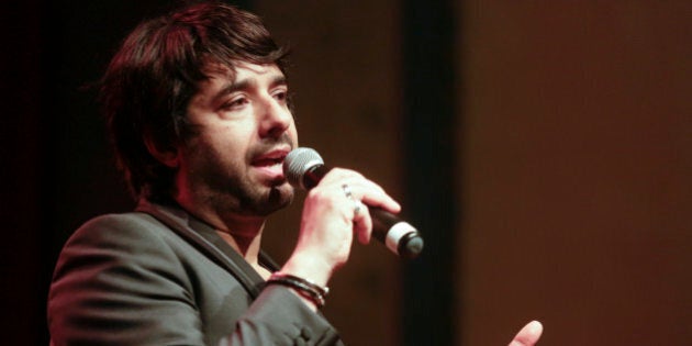 PORTLAND, OR - APRIL 24: Jian Ghomeshi records a live show at Aladdin Theater on April 24, 2014 in Portland, Oregon. (Photo by Natalie Behring/Getty Images)