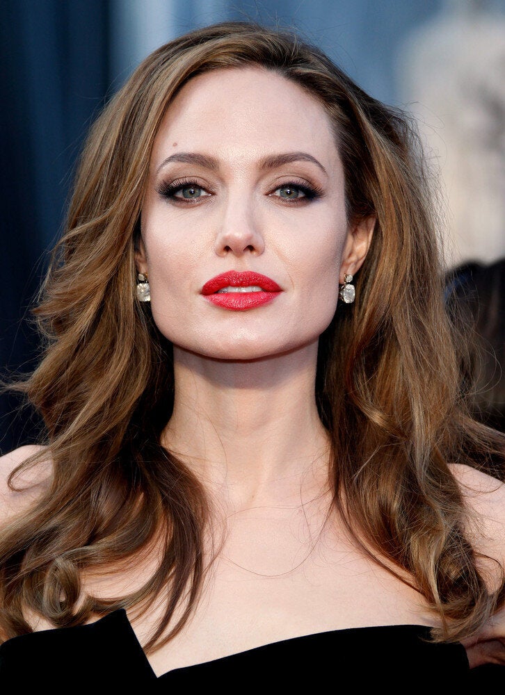 Angelina Jolie Flaunts Her Legs For Interview Russia | HuffPost Style