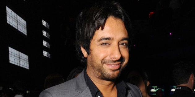 Canadian broadcaster Jian Ghomeshi attends the Opening Night Party for the 2013 Toronto International Film Festival at Maple Leaf Square on Thursday, Sept. 5, 2013 in Toronto. (Photo by Arthur Mola/Invision/AP)