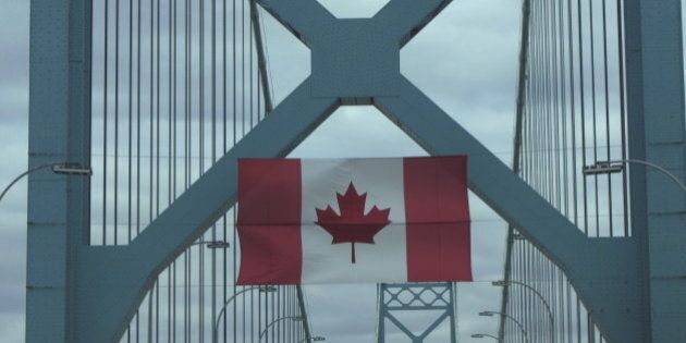 Canadian flag hanging on Ambassador bridge.