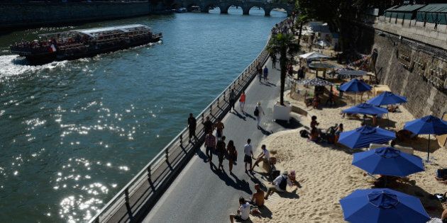 PARIS, FRANCE - AUGUST 01: General view of 'Paris Plage', an artificial beach set up on the right bank of the Seine river is seen on August 1, 2013 in Paris, France. (Photo by Pascal Le Segretain/Getty Images)