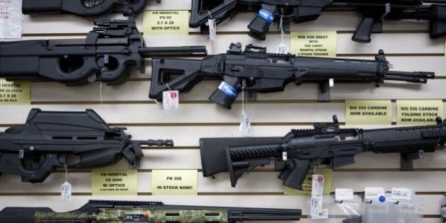 SAN ANTONIO, TEXAS - JUNE 17: Semi-automatic weapons for sale are on display at Texas Gun, one of the 6,700 gun dealers located near the 2,000 miles long U.S.-Mexico border, where Gina Brewer, the manager, insists that she has not sold weapons to Mexican drug cartels representatives, in San Antonio, June 17 2009. Automatic weapons such as AK-47 and AR-15 are purchased in U.S. border states by straw men (paid about $100 per weapons) working for Mexican drug cartels and smuggled into Mexico, where they fuel the narco-violence that has caused over 15,000 death since 2006. In Mexico, where gun sales are illegal, there is only one gun store, solely for police and army supplies. The ATF estimates that 90% of the 23,000 weapons seized in Mexico since 2005 come from the U.S. Following the admission by Secretary of State Hillary Clinton that the U.S. has a responsability in the narco-violence in Mexico (and fearing that it will spill into the U.S.), the ATF, Border Patrol, Homeland Security, ICE, and local police and sheriff are now trying to stem the flow of weapons into Mexico. But surprise check points inspecting vehicules heading South, in spite of hi-tech device like gas tank cameras, are easy to spot for narco-spies, and do little to slow the flow of arms into Mexico. On the Mexican side, Customs are well equiped with machines that can scan entires trucks, but they remain vulnerable to endemic corruption. (Photo by Gilles Mingasson/Getty Images)