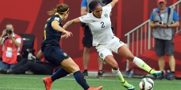 Forward Sydney Leroux of the USA (R) vies for the ball with Australian defender Servet Uzunlar during the Group D match of the 2015 FIFA Women's World Cup between the USA and Australia at the Winnipeg Stadium on June 8, 2015, in Winnipeg, Manitoba. AFP PHOTO/JEWEL SAMAD (Photo credit should read JEWEL SAMAD/AFP/Getty Images)