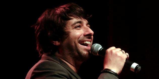 PORTLAND, OR - APRIL 24: Jian Ghomeshi records a live show at Aladdin Theater on April 24, 2014 in Portland, Oregon. (Photo by Natalie Behring/Getty Images)