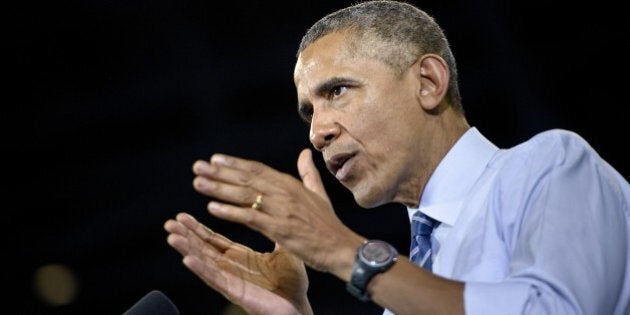 US President Barack Obama speaks at Georgia Tech on March 10, 2015 in Atlanta, Georgia. Obama spoke about making collage more affordable. AFP PHOTO/BRENDAN SMIALOWSKI (Photo credit should read BRENDAN SMIALOWSKI/AFP/Getty Images)