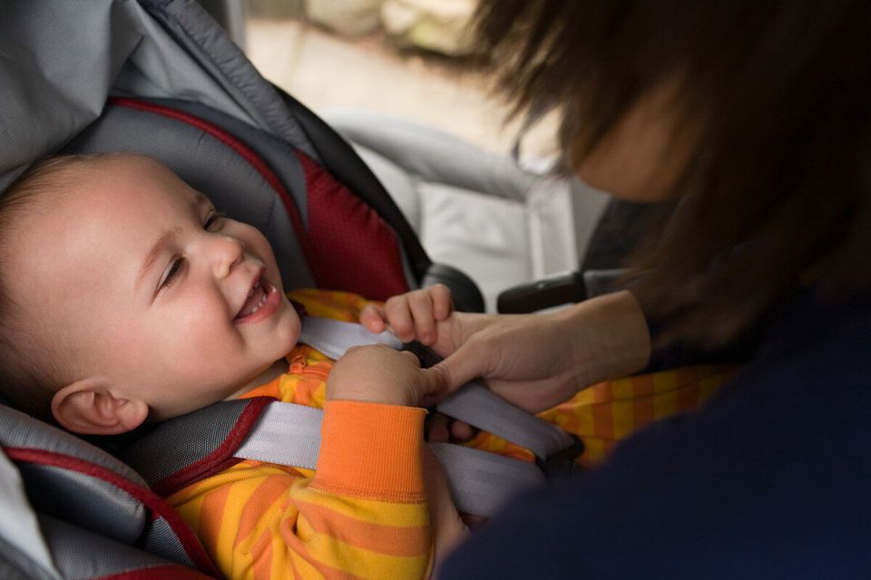 1. Tug on your kid’s car seat where the seat belt goes. If it moves more than 1 inch, tighten it up.