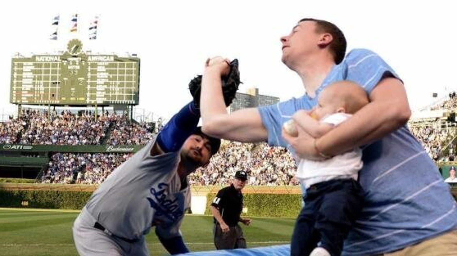 Dad Catches Foul Ball While Holding Son At Chicago Cubs Game. But He Shouldn't Have. HuffPost