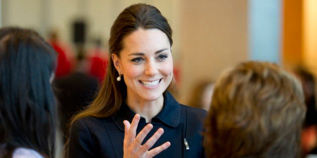Kate the Duchess of Cambridge attends a forum during her charity visit at the offices of Clifford Chance in the Canary Wharf business district of London, Wednesday, Nov. 20, 2013. The Duchess of Cambridge in her capacity as patron of the charity