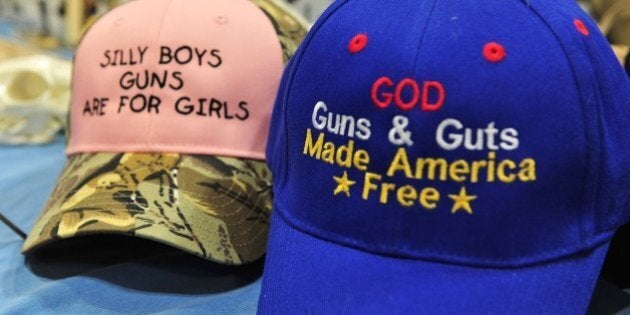 Merchandise for sale is displayed at the 2015 NRA Annual Convention in Nashville, Tennessee on April 10, 2015. The annual NRA meeting and exhibit, expected to draw over 70,000 people, runs till April 12. AFP PHOTO / KAREN BLEIER (Photo credit should read KAREN BLEIER/AFP/Getty Images)