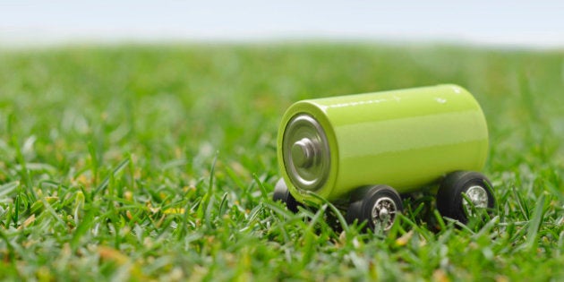 Green battery car on the lawn