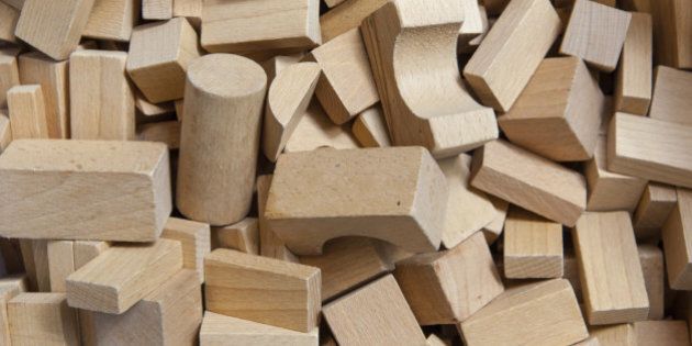 Background of Wooden Building Blocks in a Box