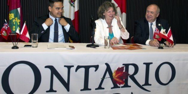 The commercial counselor of the Ontario government at the Canadian embassy in Mexico, Chantal Ramsay (C), XVII Pan-American games board member Victor Garcia (R), and press attache Fulvio Martinez, attend a press conference in Mexico City on May 25, 2015, to explain details about the next Toronto 2015 XVII Pan-American Games. AFP PHOTO/OMAR TORRES (Photo credit should read OMAR TORRES/AFP/Getty Images)