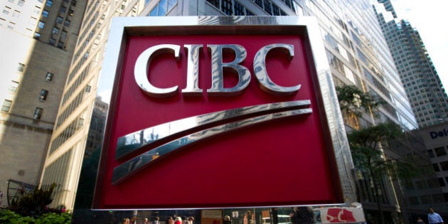 Canadian Imperial Bank of Commerce (CIBC) signage is displayed outside of the company's office near Bay Street in Toronto, Ontario, Canada, on Monday, Aug. 29, 2011. Bay Street is the center of Toronto's Financial District and is often used as a metaphor to refer to Canada's financial industry. Photographer: Brent Lewin/Bloomberg via Getty Images