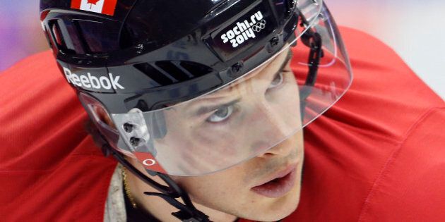 Canada forward Sidney Crosby waits for a pass during a training session at the 2014 Winter Olympics, Monday, Feb. 10, 2014, in Sochi, Russia. (AP Photo/Julie Jacobson)