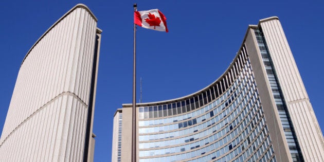 The upper portion of the twin curved towers of Toronto's unusual city hall.