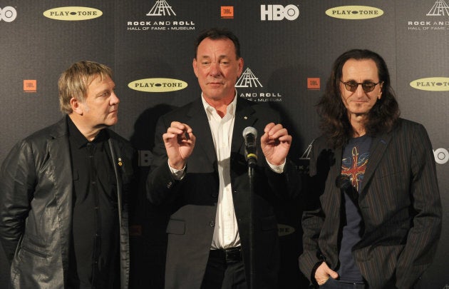 Alex Lifeson, Neil Peart and Geddy Lee of Rush at the 28th Annual Rock and Roll Hall of Fame Induction Ceremony April 18, 2013 in Los Angeles, California. (Photo: Mark Sullivan/FilmMagic)