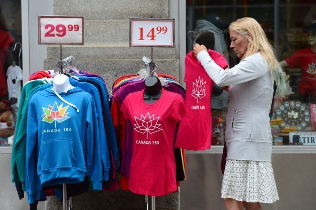 A woman looks at Canada 150 merchandise for sale in Ottawa on Thursday, June 22, 2017.