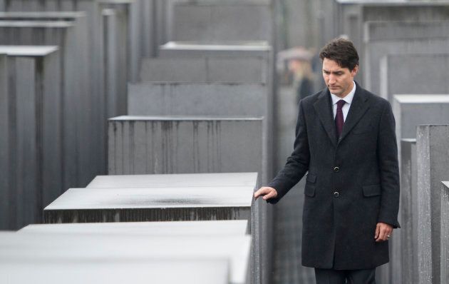 Prime Minister Justin Trudeau walks through the Memorial to the Murdered Jews of Europe, also called the Holocaust Memorial on Feb. 17, 2017 in Berlin, Germany.