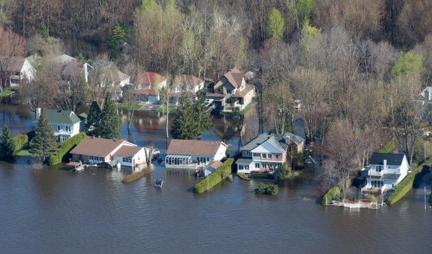 Flooded homes are seen from the air along the banks of the Ottawa River in Gatineau, Quebec, May 11, 2017.