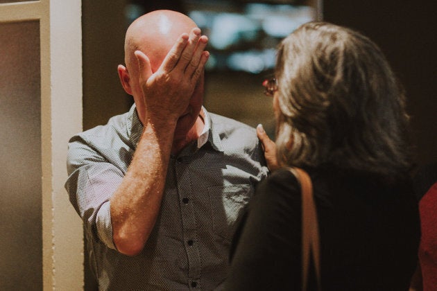 The father of the bride, Eric, and the mother of the bride, Michele, reacting to the news.