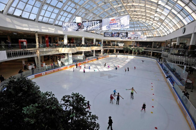 People skate at the Ice Palace skating rink at the West Edmonton Mall.