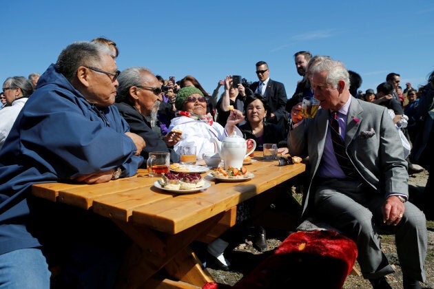 Britain's Prince Charles drinks tea during a tour of Sylvia Grinnell Park in Iqaluit, Nunavut, Canada, June 29, 2017. REUTERS/Chris Wattie