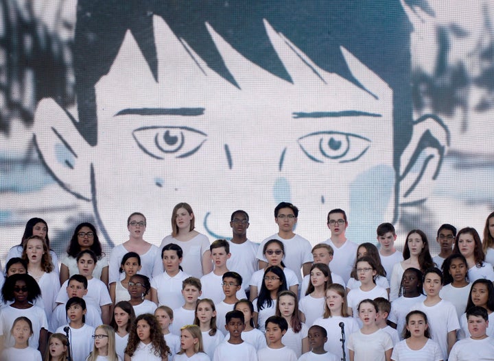 The Ottawa Children's Choir performs Tragically Hip frontman Gord Downie's song The Stranger at We Day on Parliament Hill, in Ottawa on July 2, 2017.