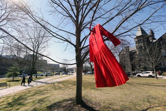 Red dresses were seen hanging from the trees on the University of Toronto campus as part of the Red Dress Project, which brings attention to Canada's missing and murdered Indigenous women and girls.