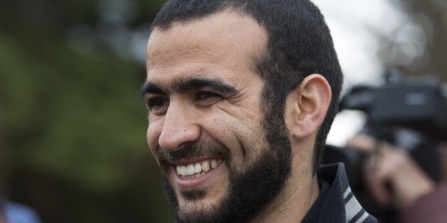 Omar Khadr smiles as he answers questions during a news conference after being released on bail in Edmonton, on May 7, 2015.