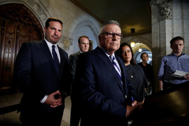 Public Safety Minister Ralph Goodale takes part in a news conference with Liberal MP Marco Mendicino, Liberal MP Steven MacKinnon and Justice Minister Jody Wilson-Raybould on Parliament Hill in Ottawa on July 7, 2017.