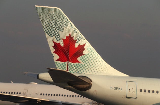 The tail end of an Air Canada airplane is seen at Toronto Pearson International Airport in Toronto, Canada on May 13, 2017.