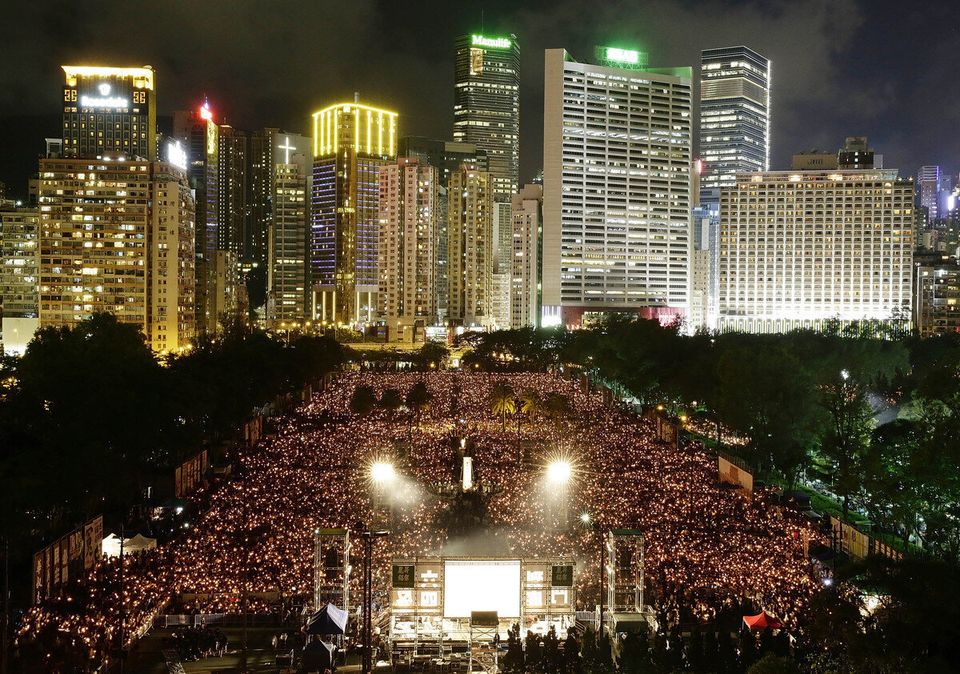 Thousands of people crowd Victoria Park to mark the 25th anniversary of Tiananmen Square protests