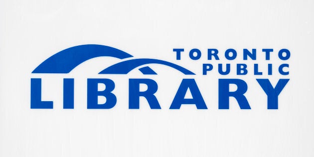 Toronto Public Library logo on a wall.