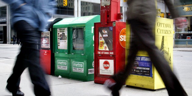 Daily newspaper boxes line the sidewalk in downtown Ottawa, April 4, 2005.