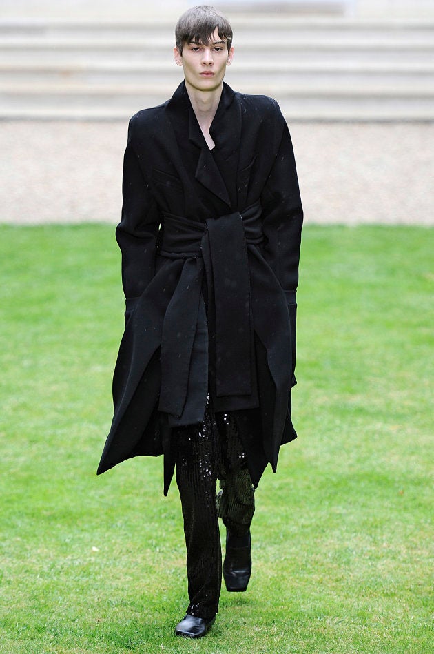 A model walks the runway at the Rad Hourani Autumn Winter 2014 fashion show during Paris Haute Couture Fashion Week on July 9, 2014 in Paris, France. (Photo by Catwalking/Getty Images)