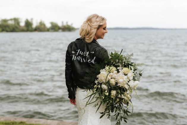 Brit Littleford posing in the jacket on her wedding day.