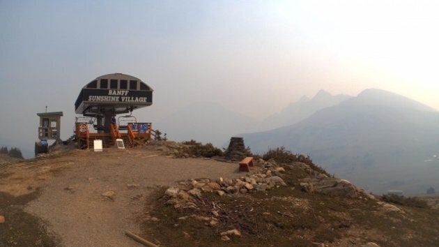 Hazy skies surround the Mt. Standish express at Banff's Sunshine Village on Monday.