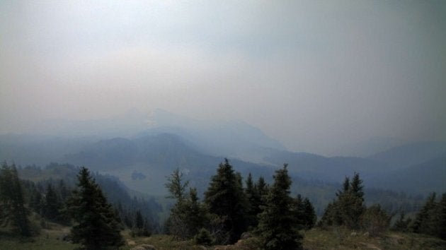 A wildfire has filled the sky with smoke in Banff, Alta. This image was taken Monday on Sunshine Village's Rock Isle Lake webcam.