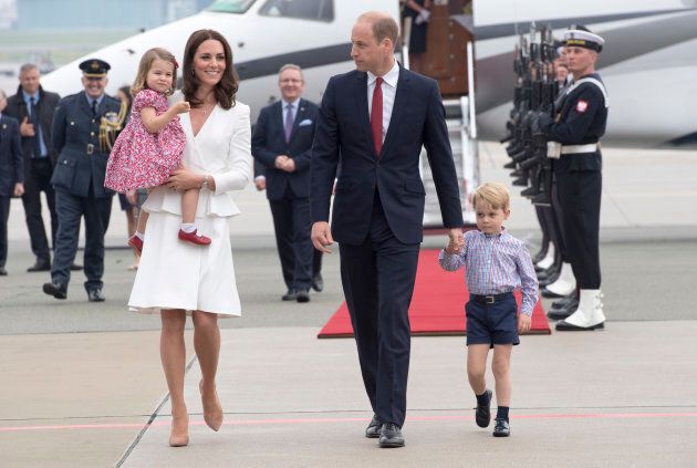 Prince William, Duke of Cambridge and Catherine, Duchess of Cambridge with their children Prince George and Princess Charlotte arrive at Warsaw airport to start a 3 day tour on July 17, 2017 in Warsaw, Poland.