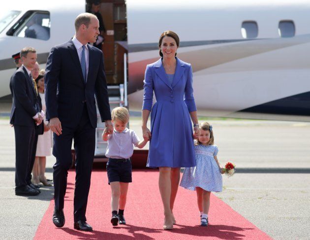 Prince William, Duke of Cambridge, his wife Kate, the Duchess of Cambridge with their children Prince George and Princess Charlotte arrive at the airport in Berlin on July 19, 2017.